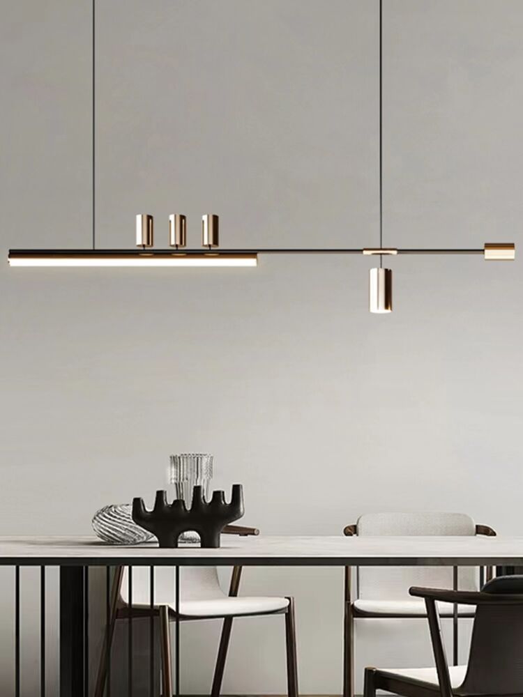 Modernistyczna lampa wisząca w kolorze złotym