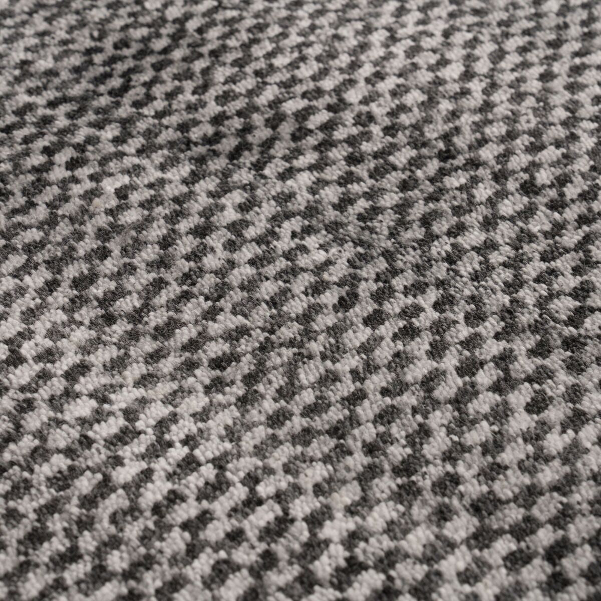 Valbo hand-woven black and white checkerboard rug